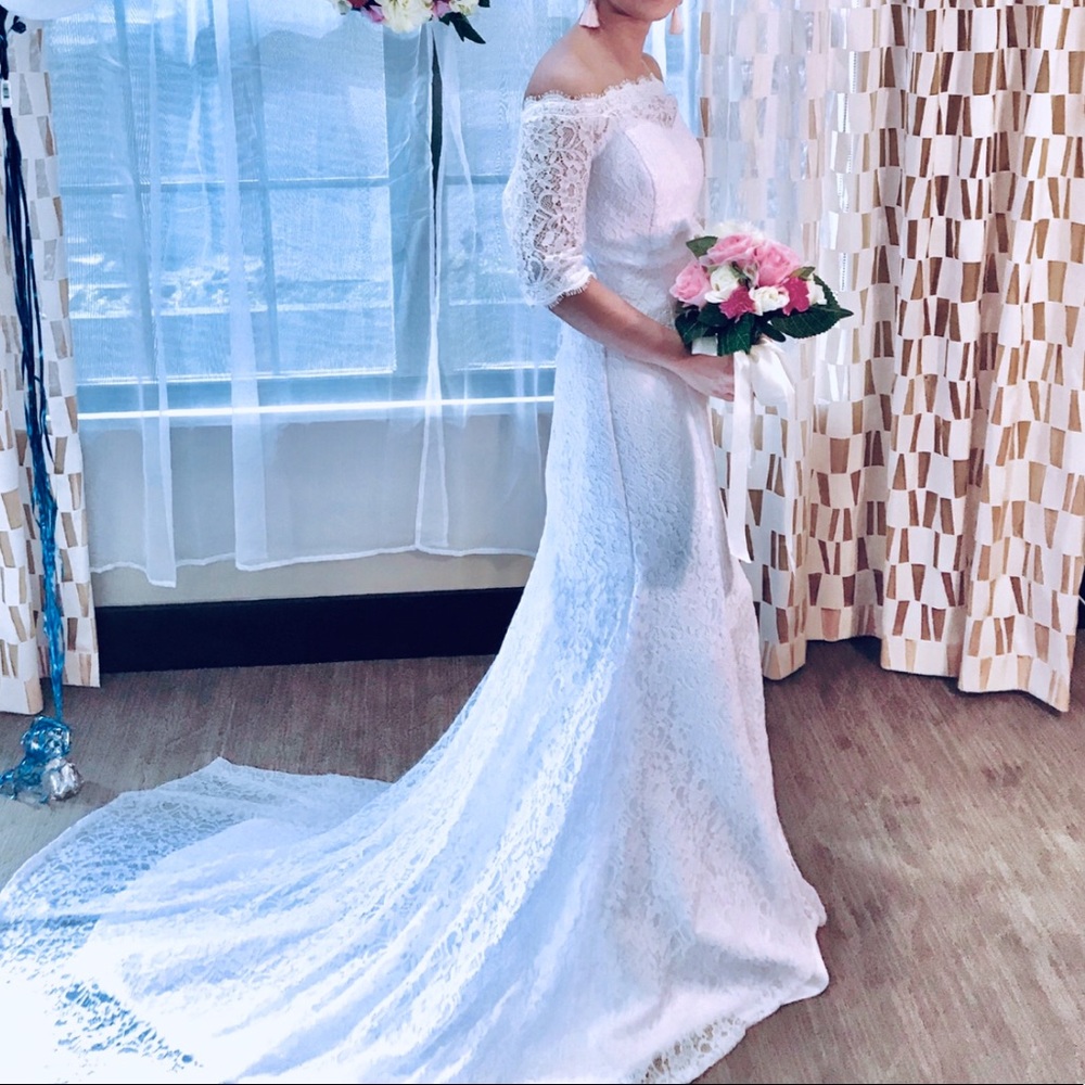 Trumpet Off-the-Shoulder Lace Train Wedding Dress